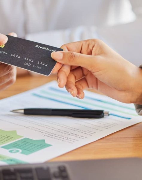 investment-manager-with-credit-card-and-document-f-2023-11-27-05-22-11-utc (1)